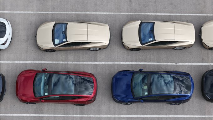 Tesla’s Cybercab seen alongside Model Y, illustrating size difference